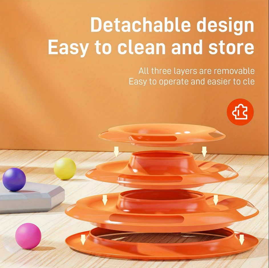 A happy cat playing with a 3-tier interactive ball toy tower. Excellent for active felines & enrichment.