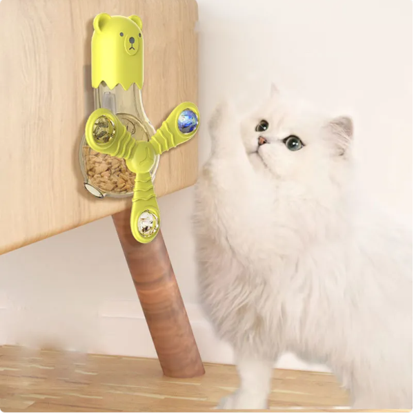 Interactive bear food dispenser cat toy with rotating arms for mental stimulation & slow feeding.