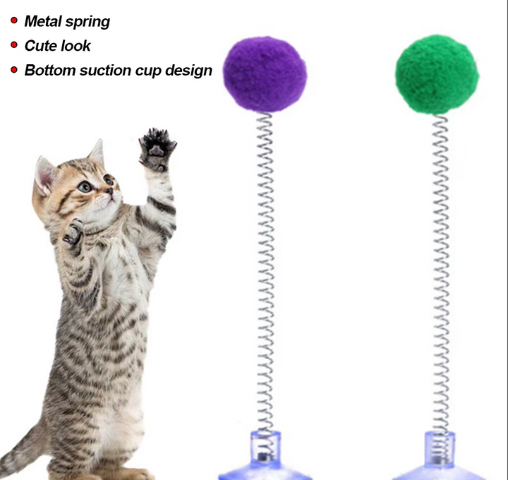 Vibrant feather cat toy with a durable suction cup base for engaging feline enrichment.