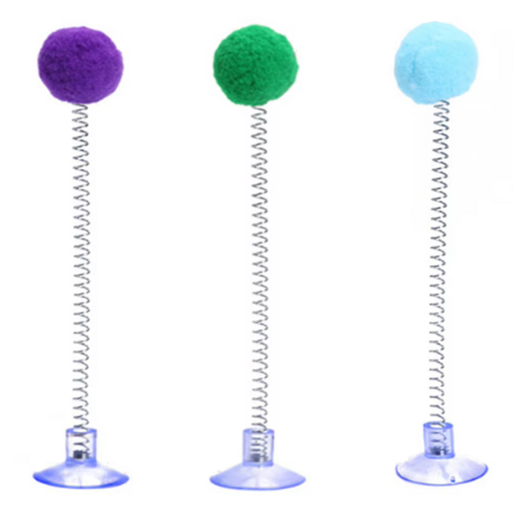 Cat's interactive feather toy with a strong suction cup, ideal for active indoor cats & kittens.