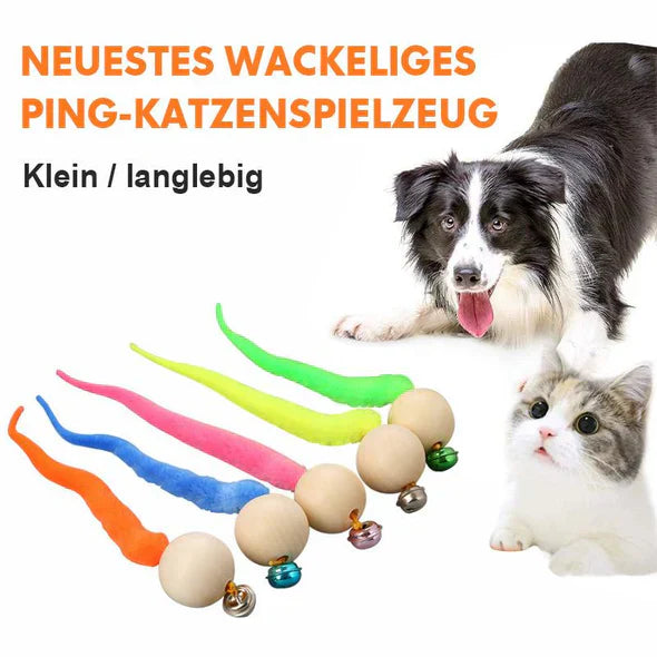 Durable interactive cat toy, close-up, showing its engaging wagging tail and jingle bell for play.