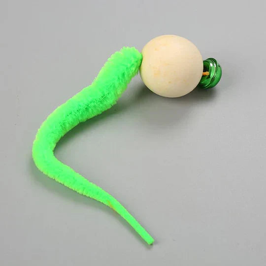 View of the interactive cat toy, highlighting its wagging tail and bell, ideal for pet exercise & enrichment.