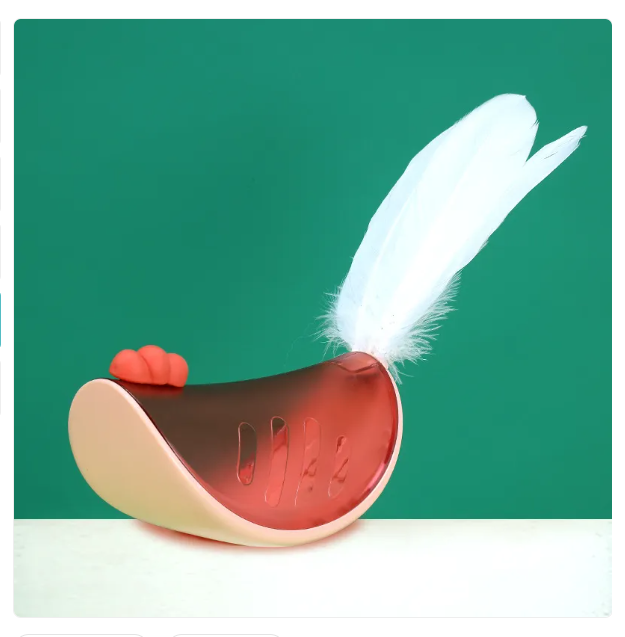 Feline fun interactive cat toy, a feather wand & treat dispenser puzzle for pet enrichment & active play.