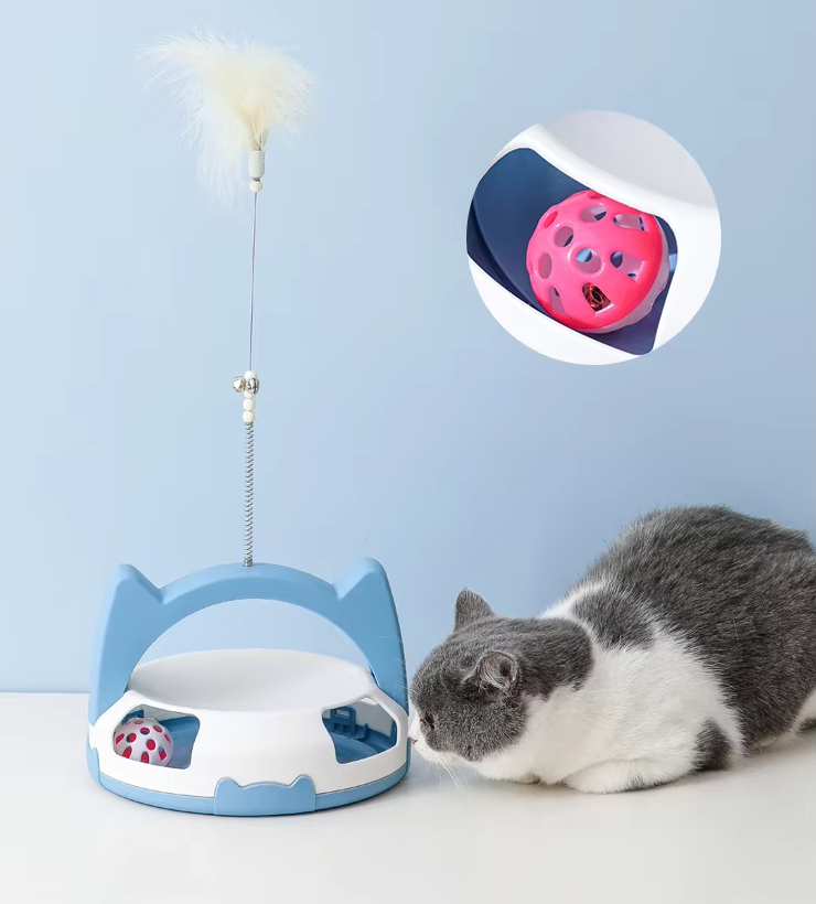 Stimulating cat toy: durable design with a playful feather and captivating rolling ball.