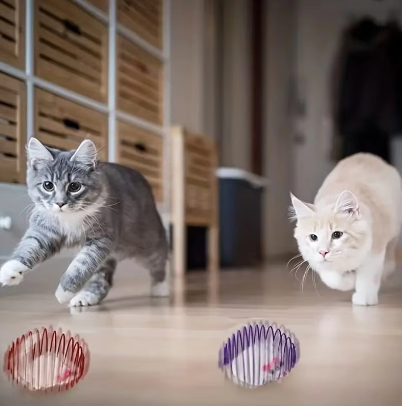 Durable interactive cat toy featuring mice in a spiral cage, providing pet enrichment & endless play for cats.