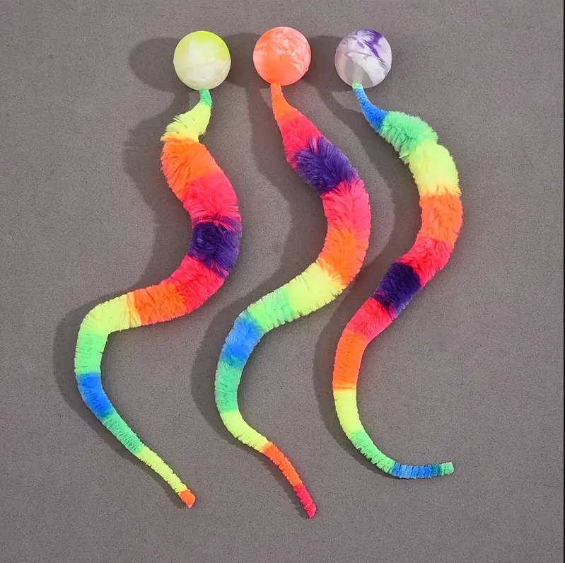 Plush tail cat toy with bell ball for interactive kitten play, promoting pet enrichment.