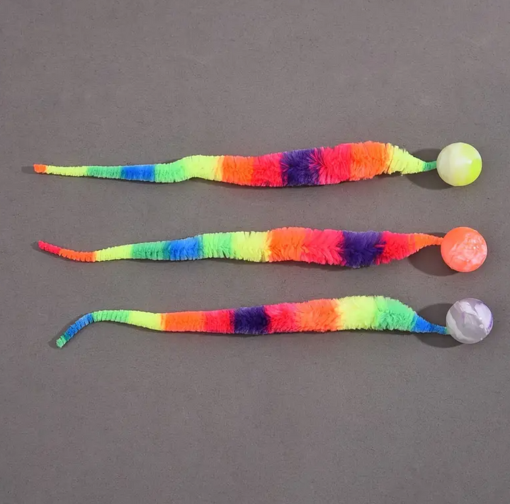 Feline interactive play toy featuring a soft plush tail and stimulating ball, great for stress relief.