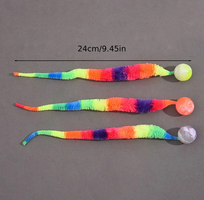 Interactive cat entertainment toy with a plush tail and durable ball, for active pet enrichment.