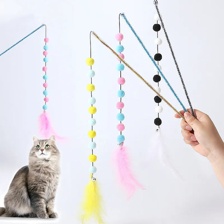 Vibrant cat feather toy with soft pompoms on a durable wand for engaging interactive pet play & animal fun.
