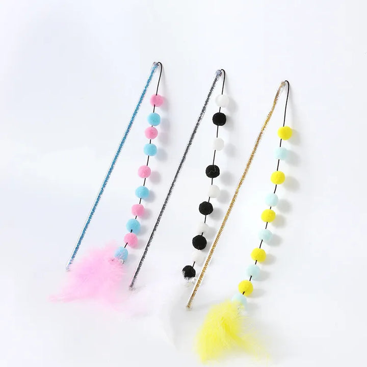 Cat's interactive play rod, an ideal boredom buster with feathers & pompoms for stimulating kitten activity.