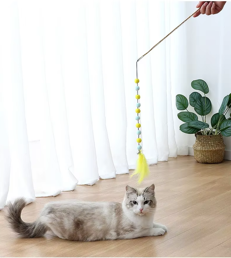 Durable cat accessory: interactive fishing rod toy with a fluffy pom-pom and real feathers, encouraging pet activity.