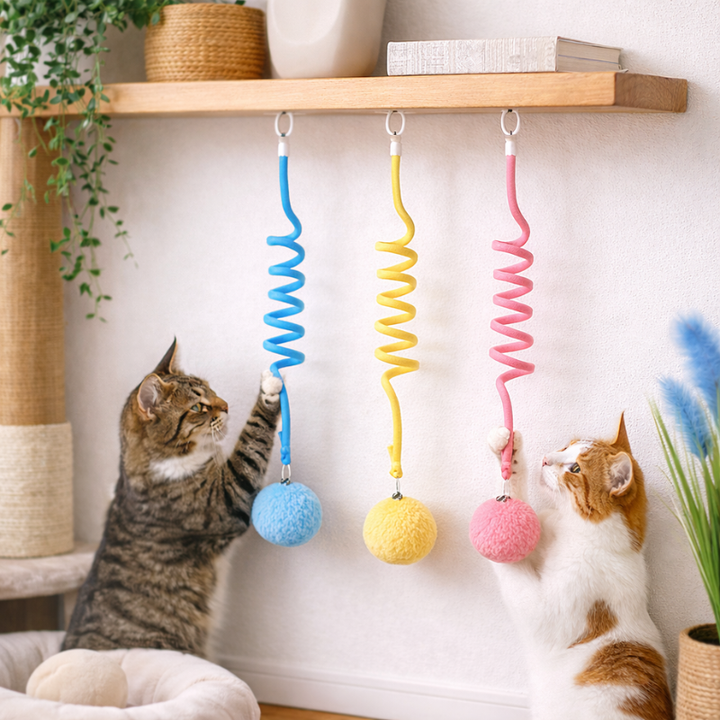 Interactive hanging cat toy with suction cup and plush ball for indoor cats