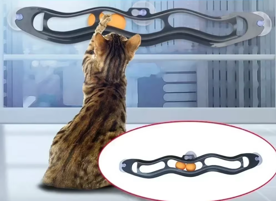Engaging window cat toy with track & balls, promoting active play & mental stimulation for your pet.