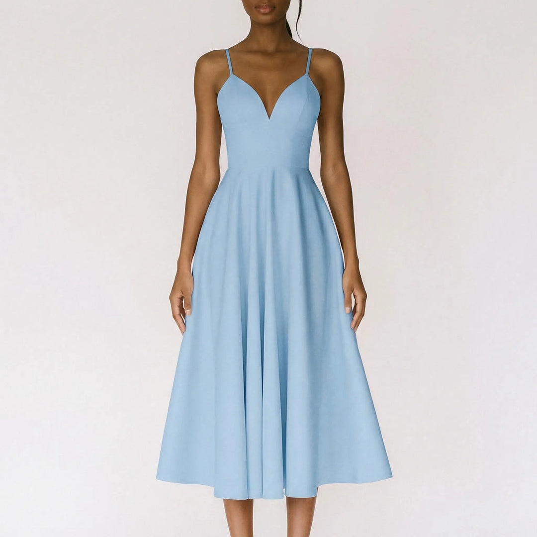 Sophisticated wedding guest dress with a sweetheart neckline and A-line silhouette.