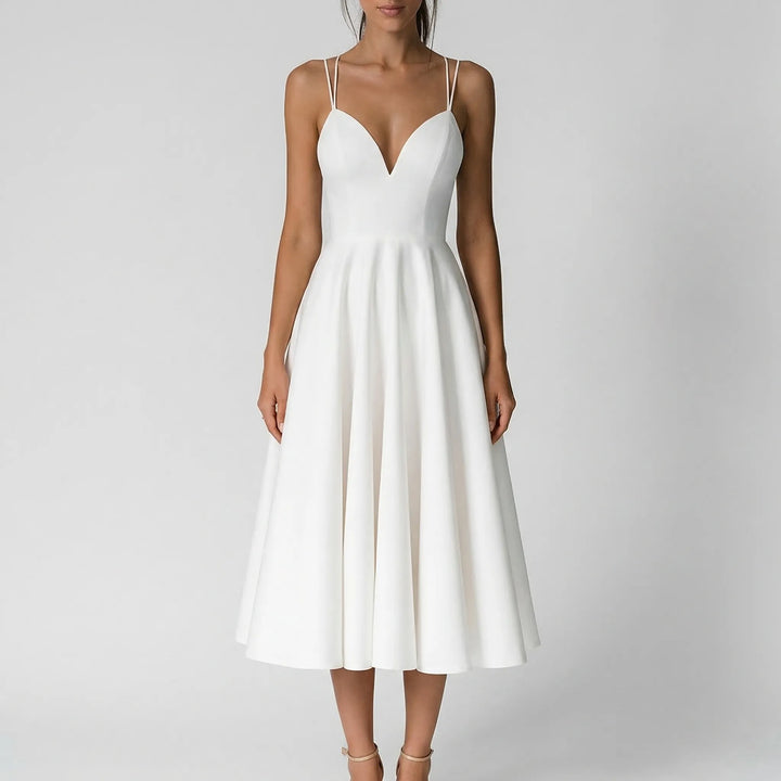 Elegant evening dress with a sweetheart neckline and flowing A-line midi skirt.