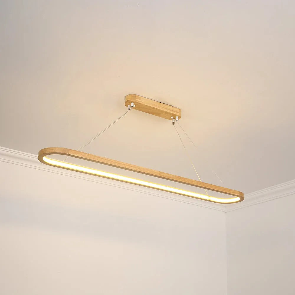 Elegant LED oval pendant light for dining rooms, featuring a sleek modern wooden & acrylic frame.