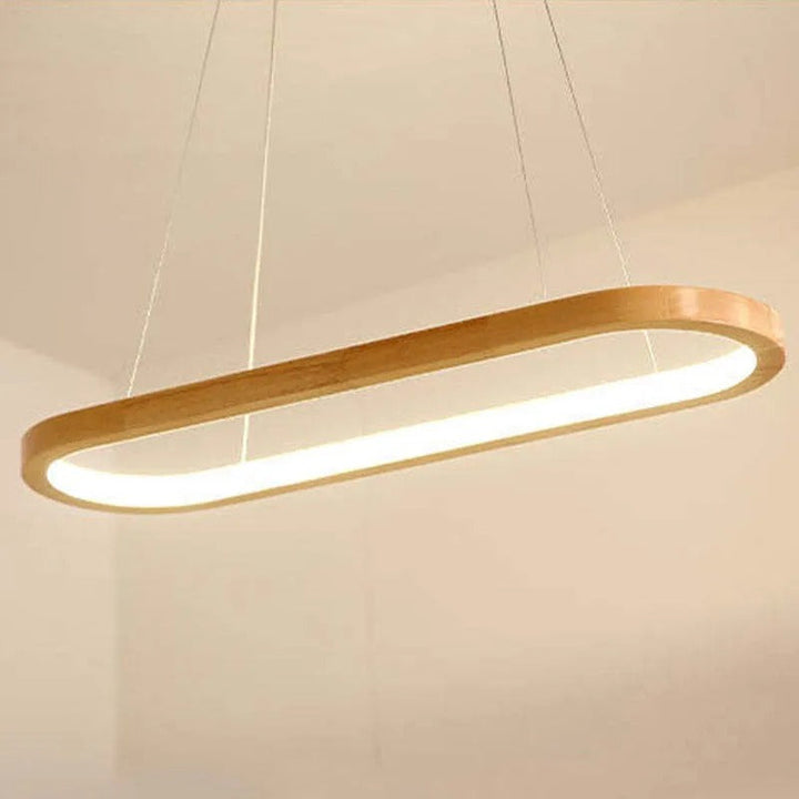 Modern oval wooden pendant light, with acrylic diffuser, ideal LED lighting for kitchen islands.