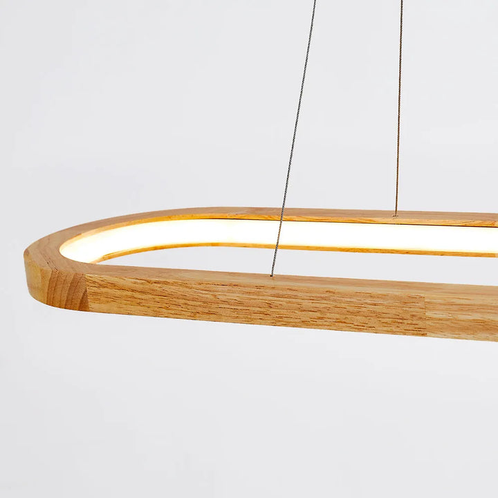 Ivyelle oval LED pendant light, energy-efficient for modern dining rooms & stylish kitchen islands.