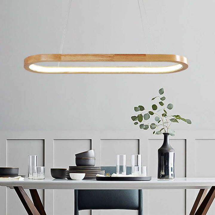 Sleek modern LED oval pendant light, perfect for kitchen island lighting & contemporary decor.