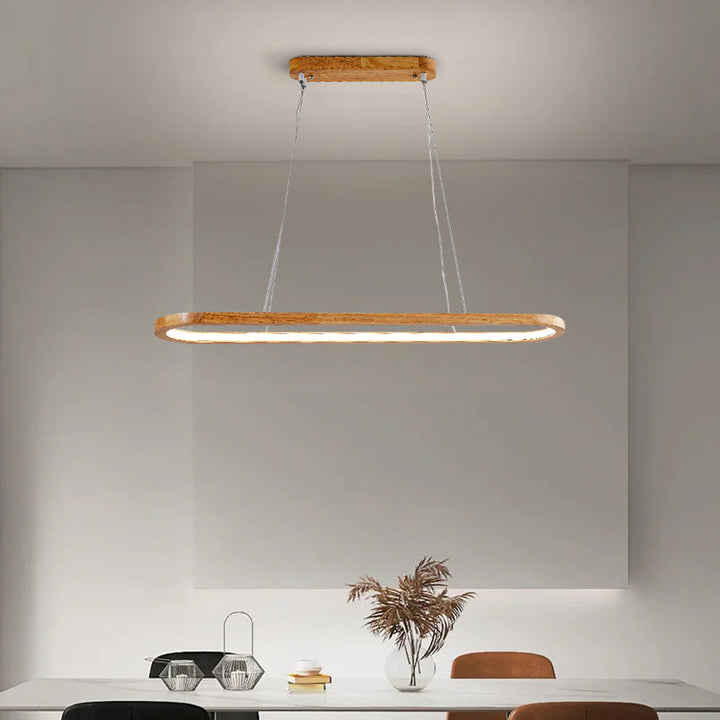 Stylish wooden and acrylic oval pendant light, ideal for illuminating dining tables & kitchens.