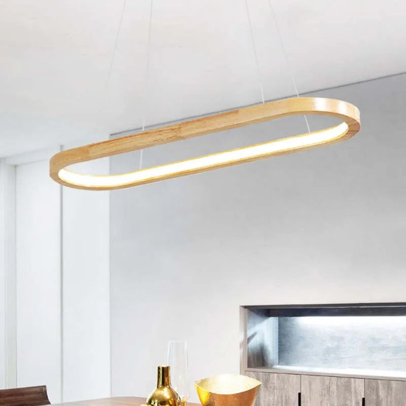 Energy-efficient LED oval wooden pendant light, enhancing kitchen island & dining room aesthetics.