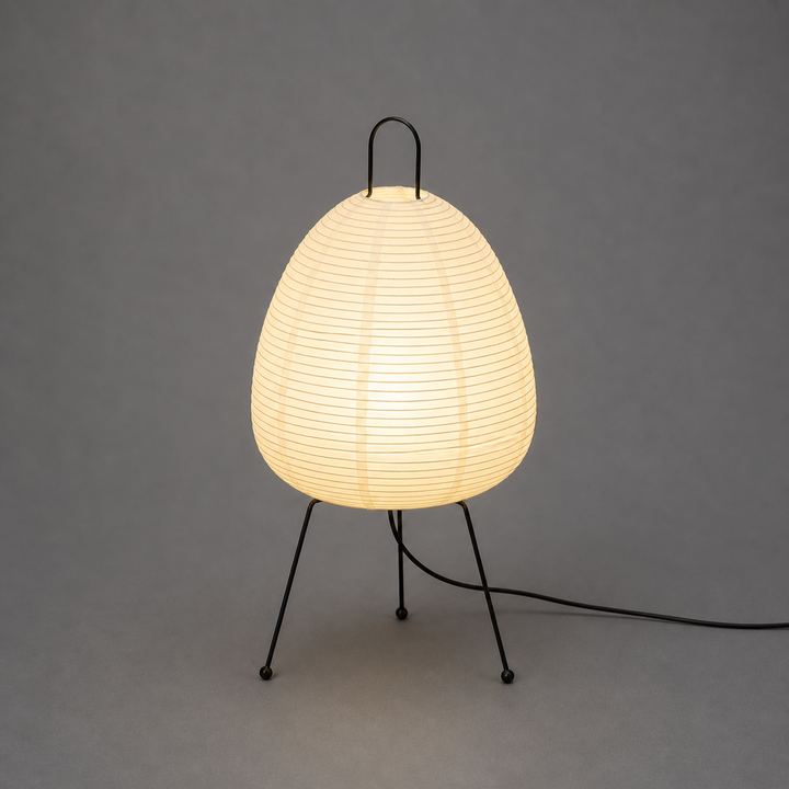 Japandi oval LED table lamp with a soft rice paper shade, perfect for minimalist bedroom or living room accent lighting.