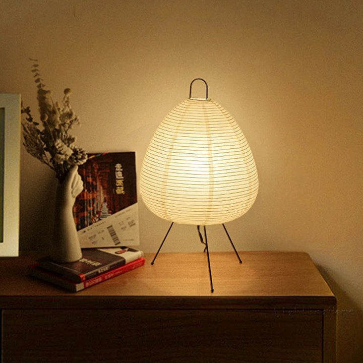 Elegant Japandi oval table lamp featuring a delicate rice paper shade and energy-efficient LED lighting for soft ambiance.