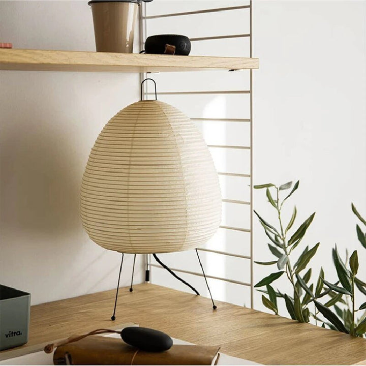 Stylish Japandi oval LED table lamp with a translucent rice paper shade. Ideal for minimalist aesthetic & soft bedroom lighting.