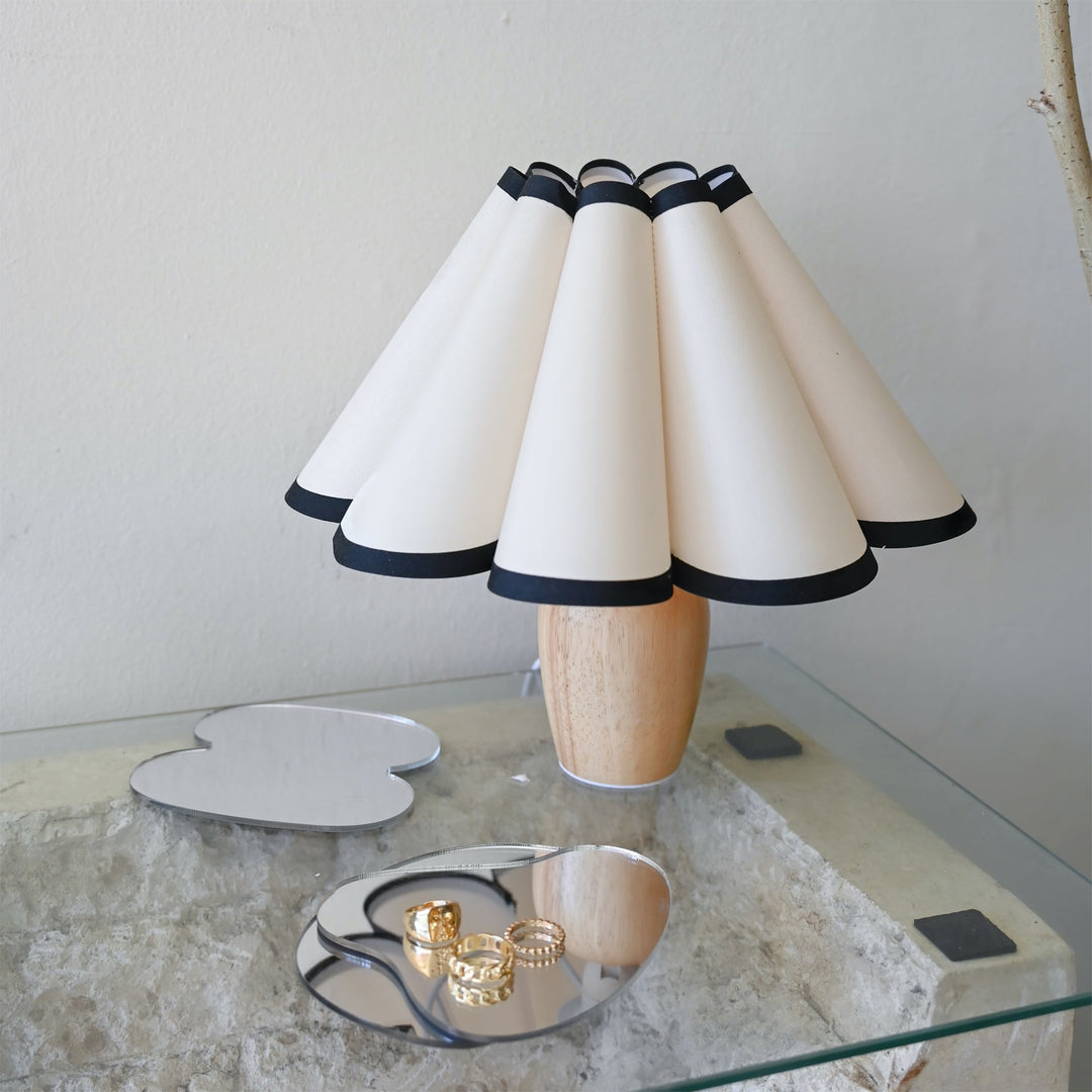 Kaianas Fluted Table Lamp, a sophisticated home decor item adding elegant accent lighting to any space.