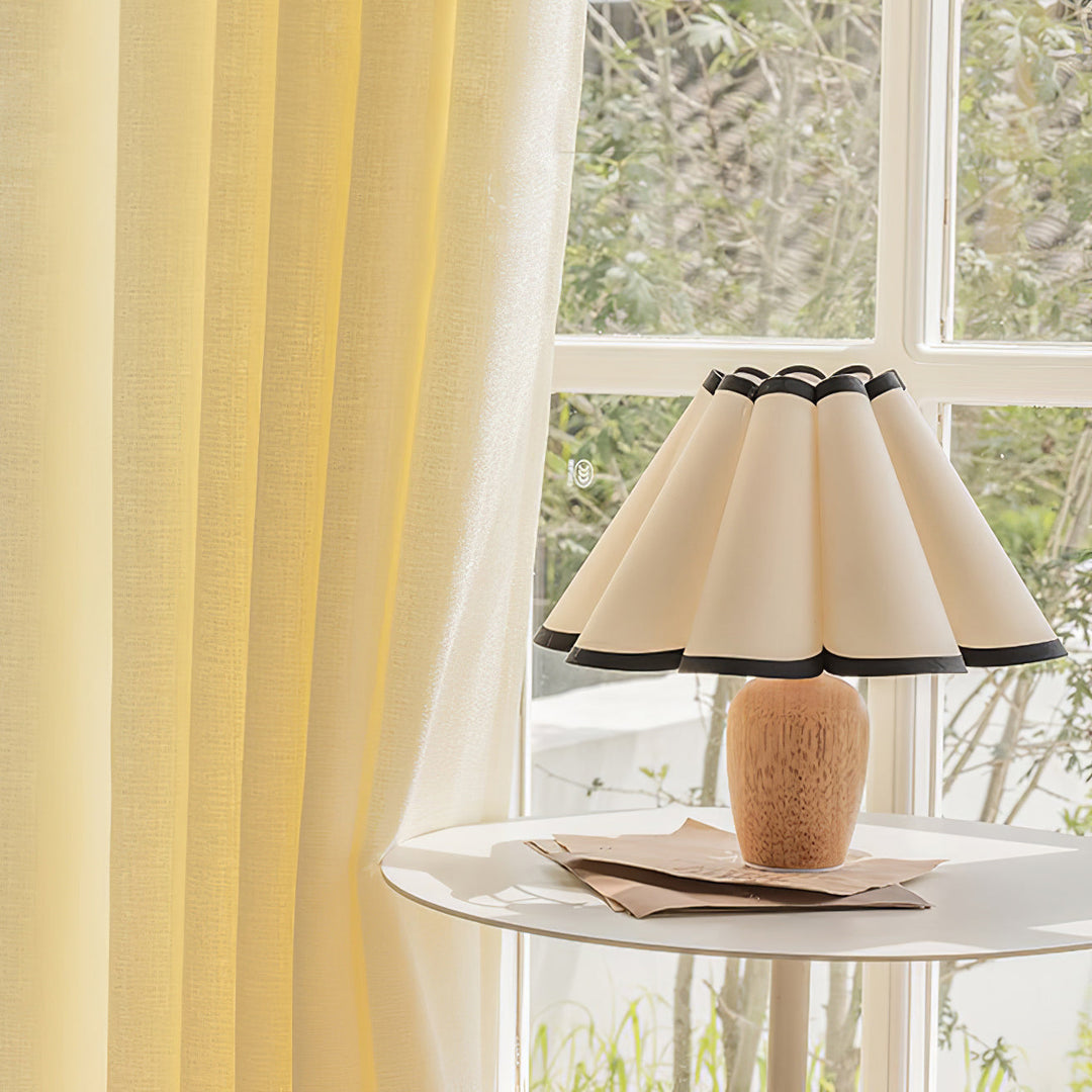 Decorative Kaianas Fluted Accent Lamp, providing elegant lighting for your home office or nightstand.