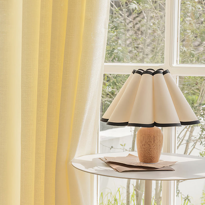 Decorative Kaianas Fluted Accent Lamp, providing elegant lighting for your home office or nightstand.