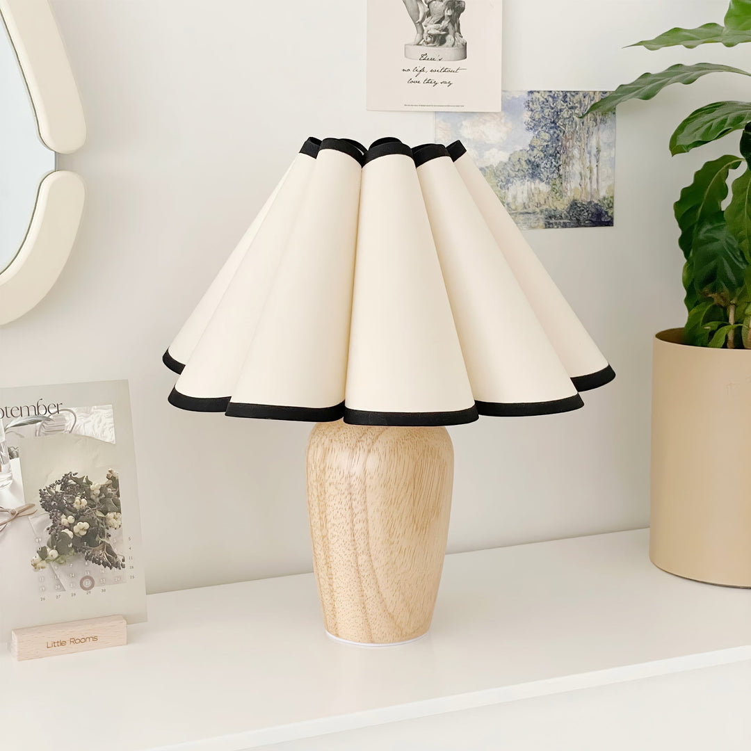 Stylish Kaianas Fluted Table Lamp, a modern decorative piece enhancing your home's accent lighting.