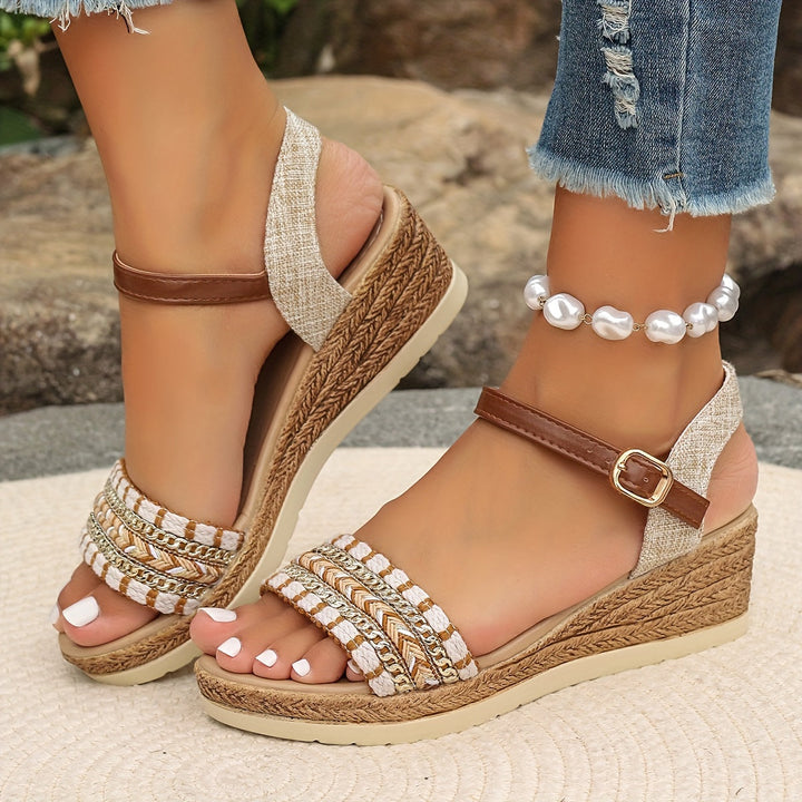 Stylish black platform wedge sandals for women, cushioned & comfortable summer wear.