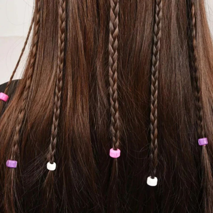 Child using the automatic hair twisting tool for quick and simple braiding