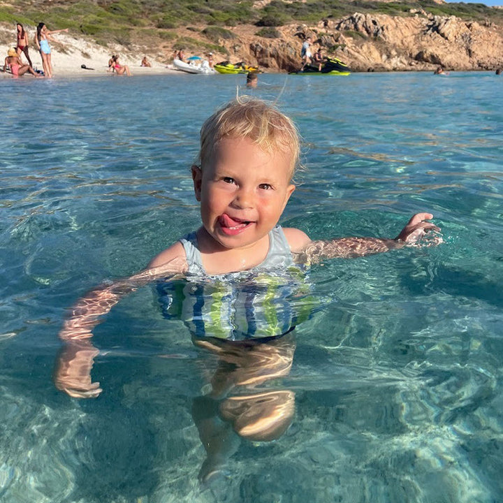 Essential beach gear: a reliable kids life jacket for water safety.