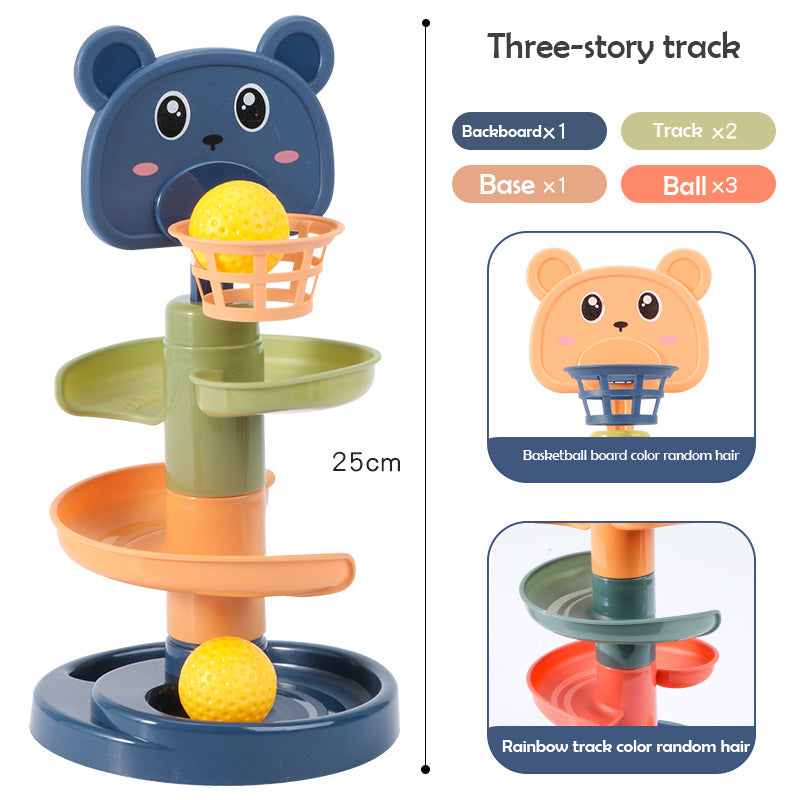 Close-up of a red ball dropping through a preschool toy tower