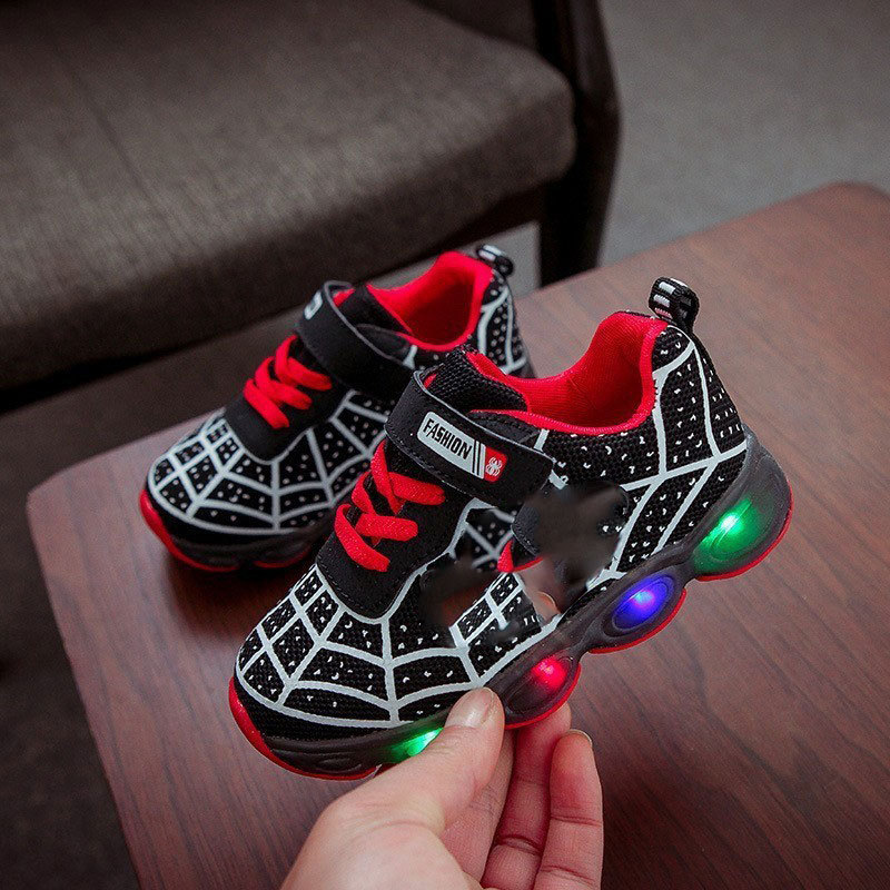 Durable light-up sneakers for kids, featuring a fun superhero design and durable soles