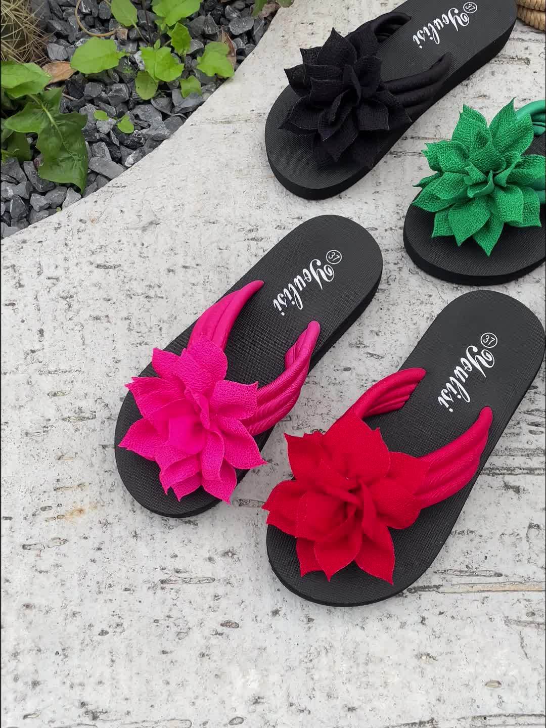 Essential ladies' wide fit platform flip flops with flower detail for ultimate summer comfort.