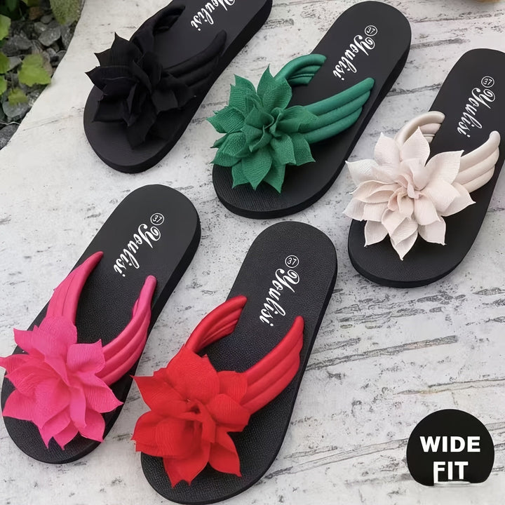 Comfort-focused wide fit platform flip flops for women, featuring a stylish floral design.