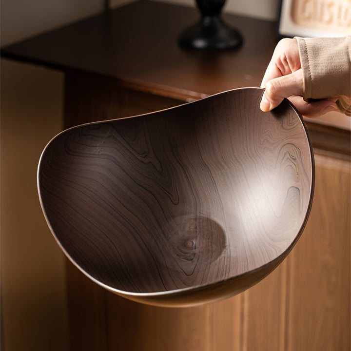 Practical wood-look serving dish for fruits & snacks, enhancing kitchen decor with organic design.