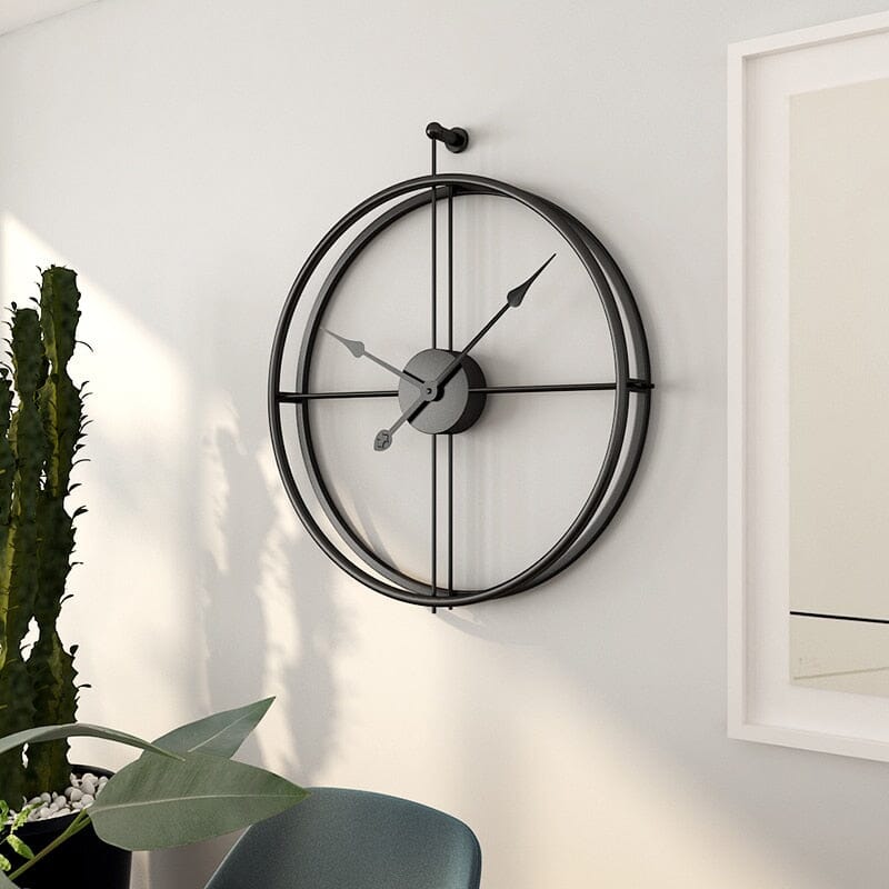 Abstract geometric metal wall clock, large silent modern design. Enhances living room & office decor.