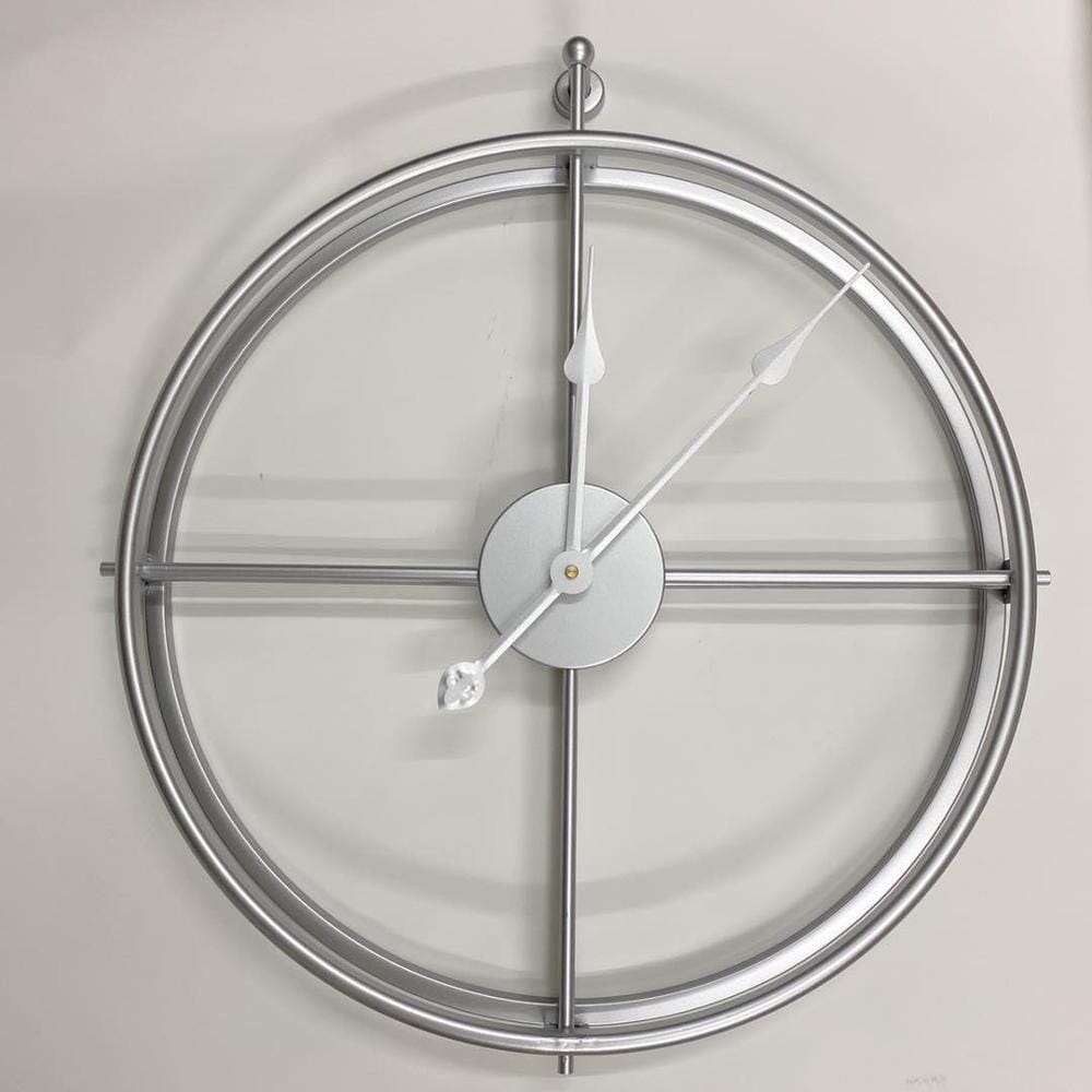 Statement large geometric metal wall clock, silent. Modern minimalist design for living room or office.