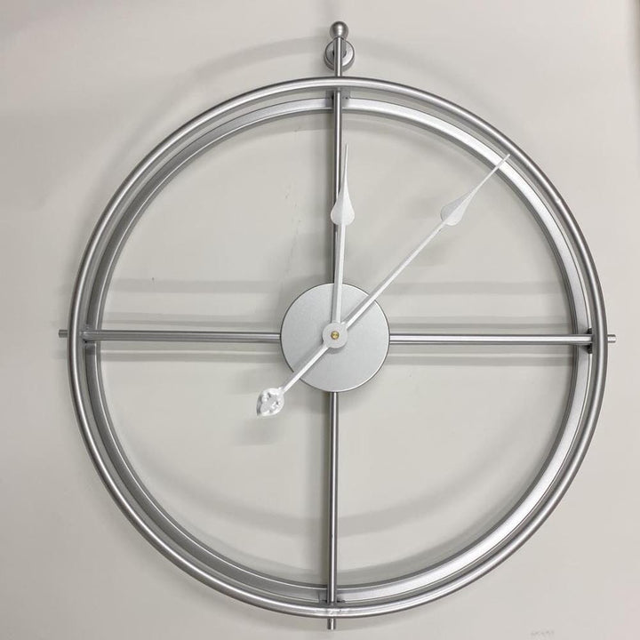 Statement large geometric metal wall clock, silent. Modern minimalist design for living room or office.