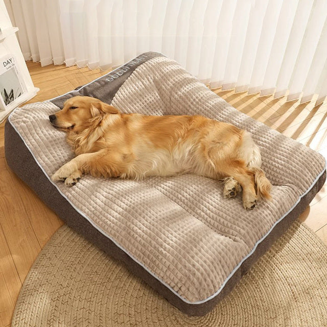 Large grey orthopaedic dog bed with high-density foam for big breeds, offering joint support & comfort.