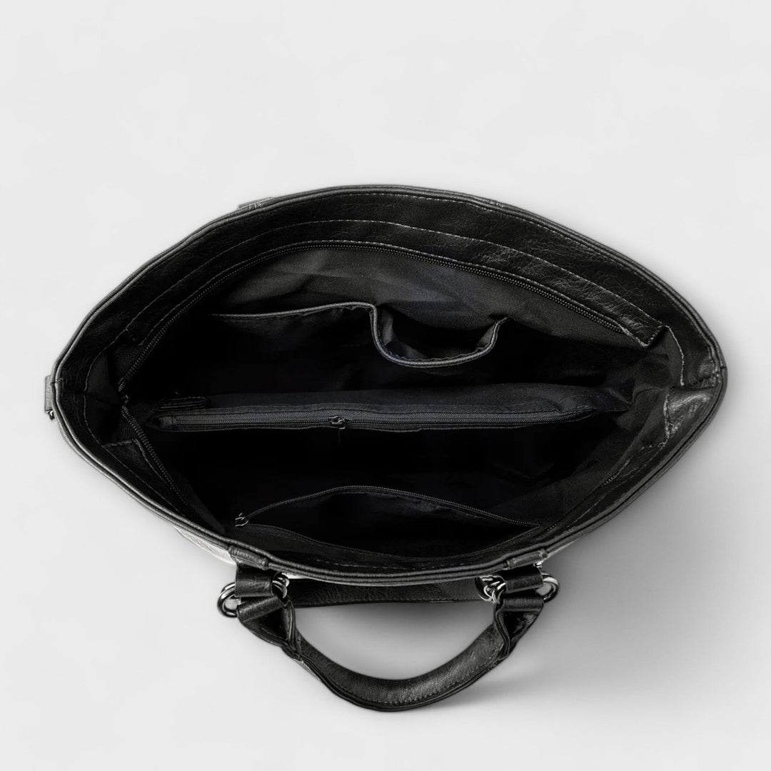 Versatile women's large leather tote, a chic shoulder bag for fashion and utility.