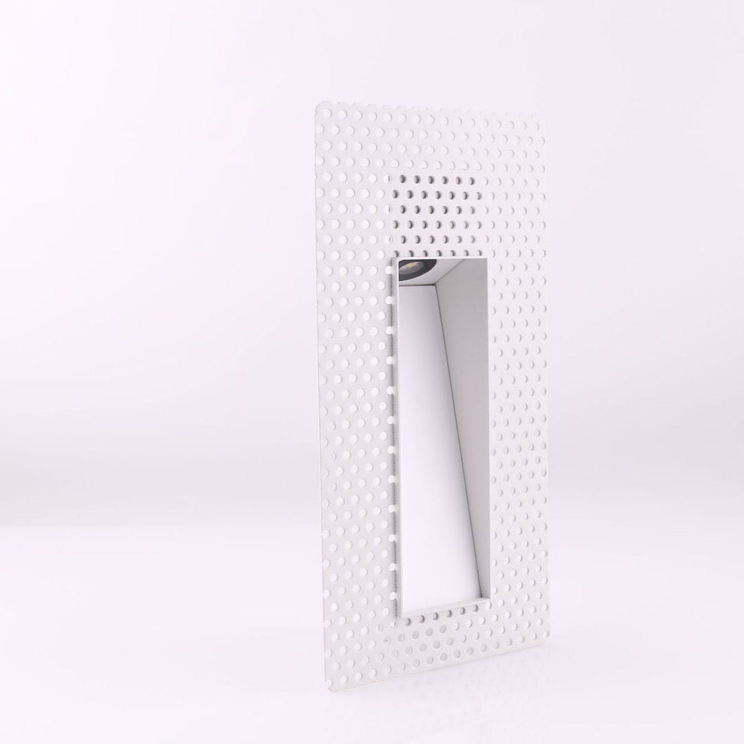 Square LED recessed wall light for minimalist hallway and stair accent lighting.