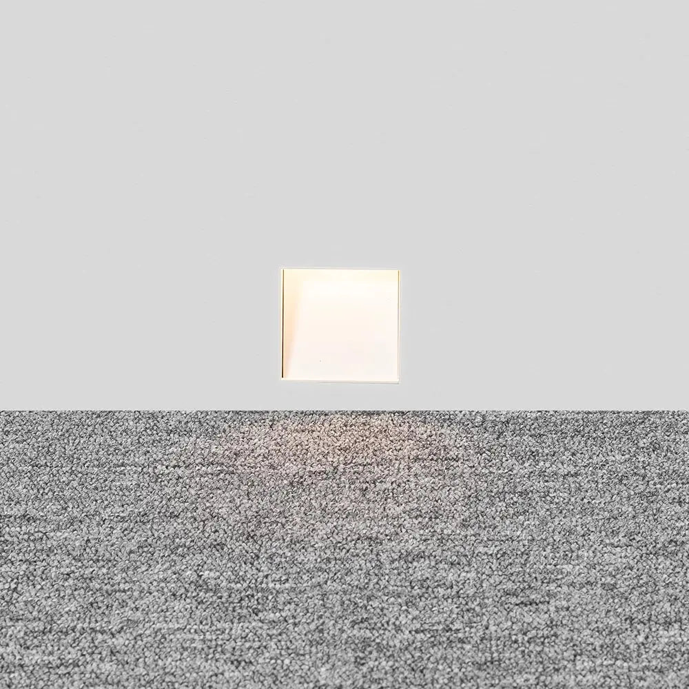Discrete LED recessed light, enhancing modern interior design on stairs.