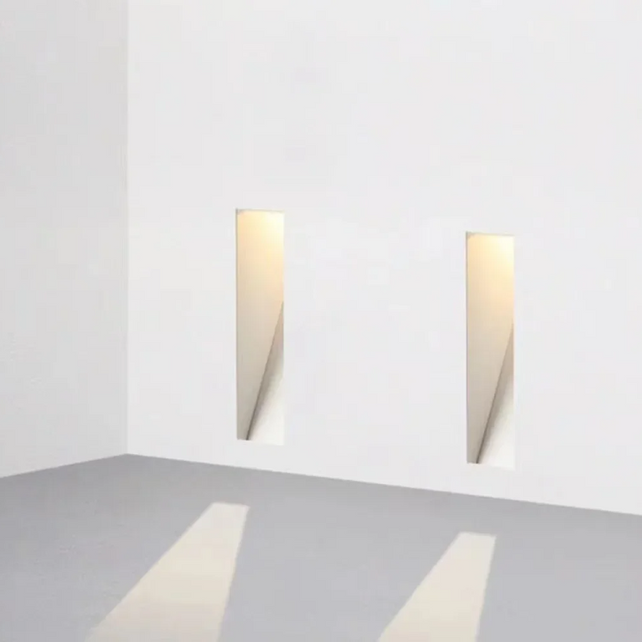 Ambient LED guide light for safe passage in dark hallways and stairwells.