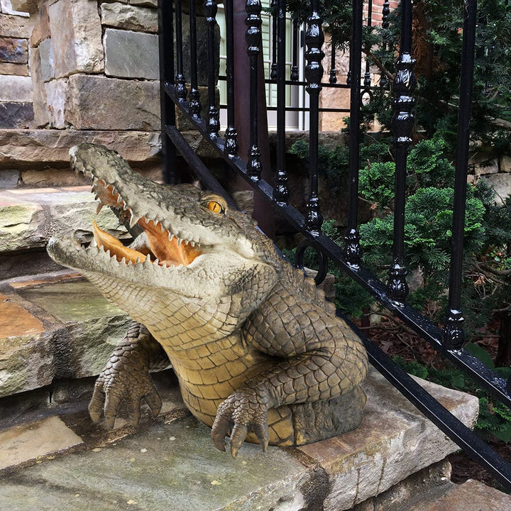Detailed view of a 19-inch lifelike resin crocodile garden statue, ideal outdoor wildlife art.