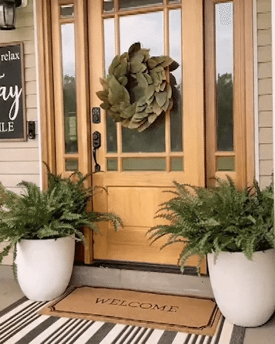 UV resistant faux Boston fern plant, enhancing outdoor spaces with realistic, lasting greenery.